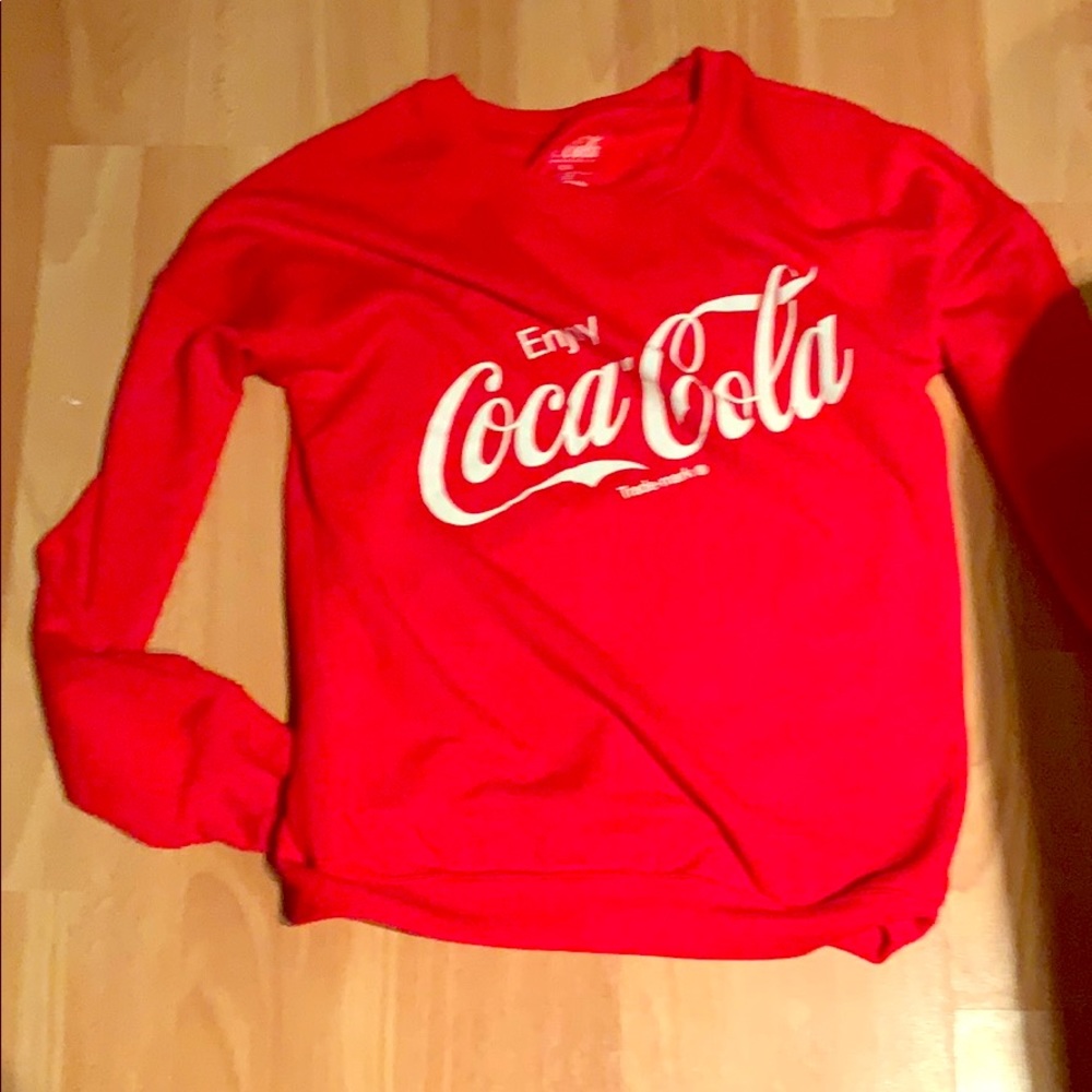 I am selling, a coco cola sweatshirt ( not used)
